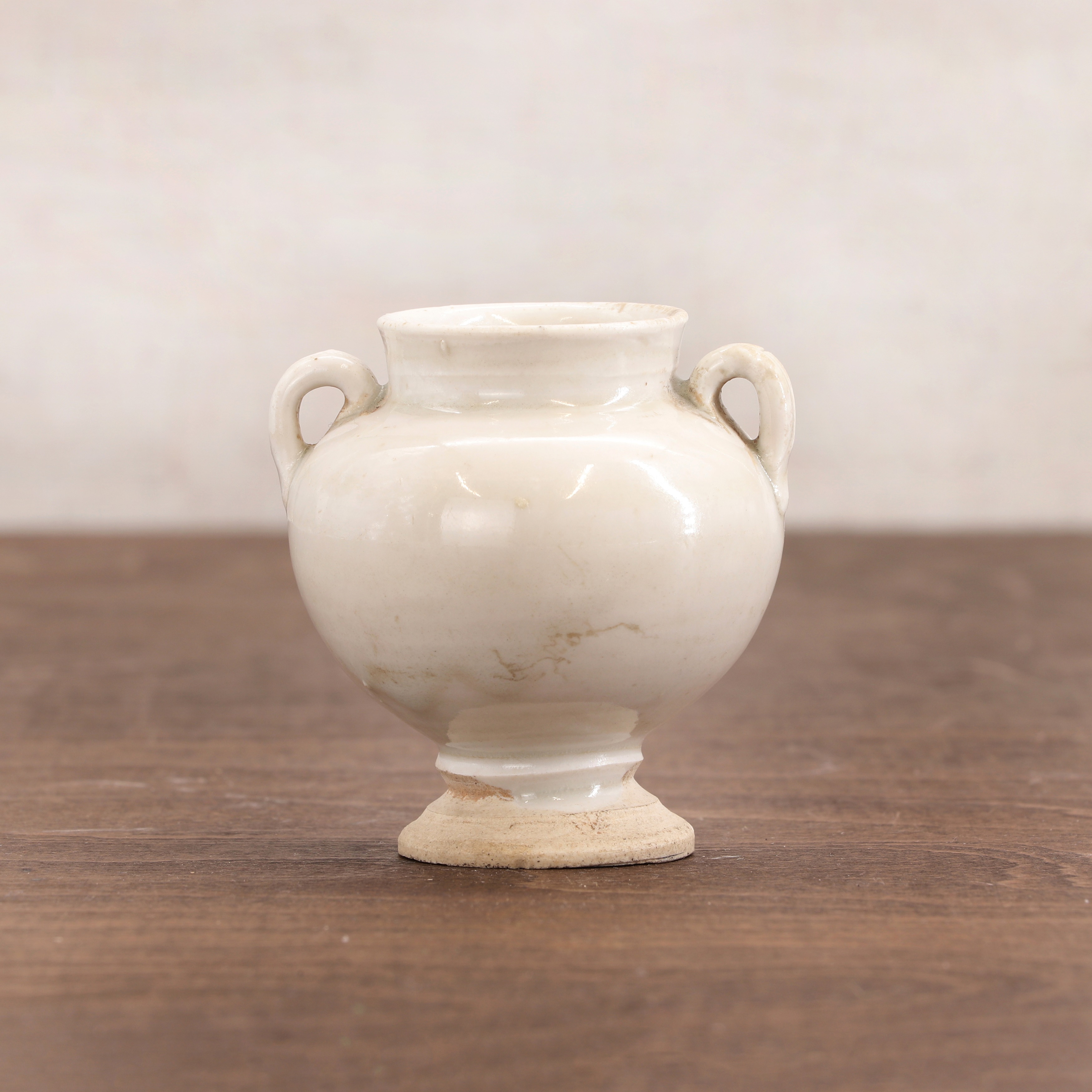A Chinese Ding ware vase (£300-500)